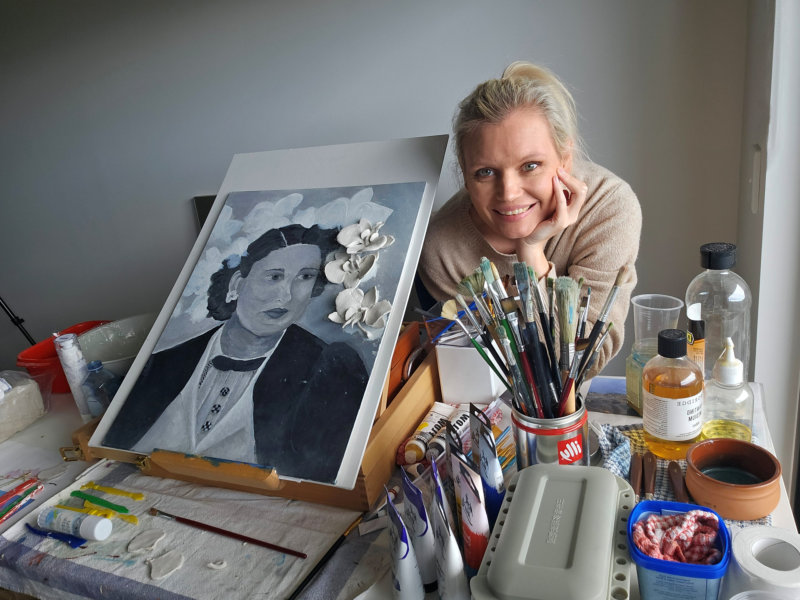 About me and my art progression. Posing here with a work in progress portrait art piece of my grandmother. 